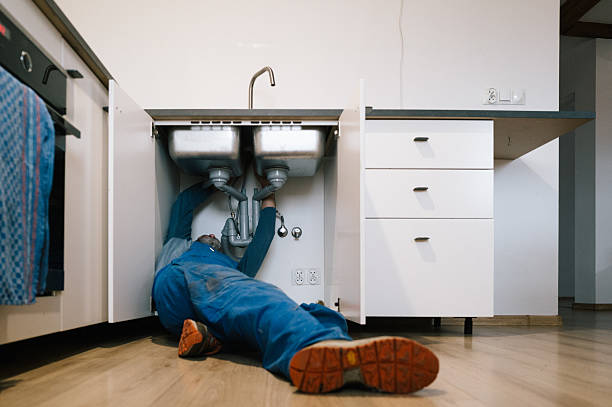 Professional Drain Cleaning technician working in Chester, IL